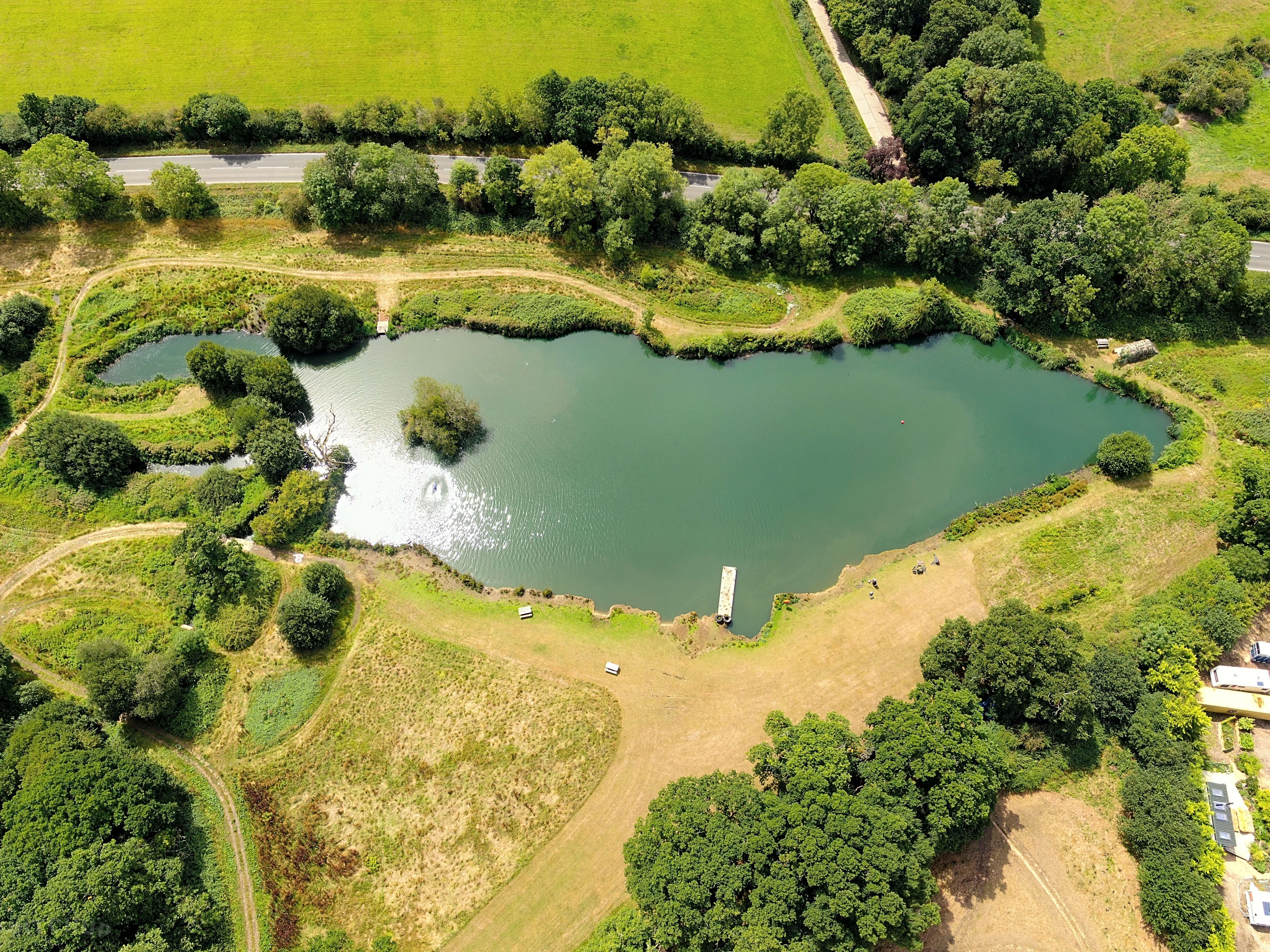 Aerial view of the private carp fishing lake at Marwell Resort.